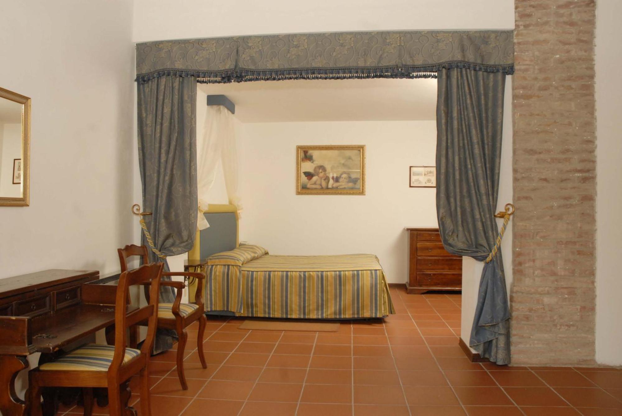 Relais Borgo Di Toiano Casa de hóspedes Sovicille Quarto foto